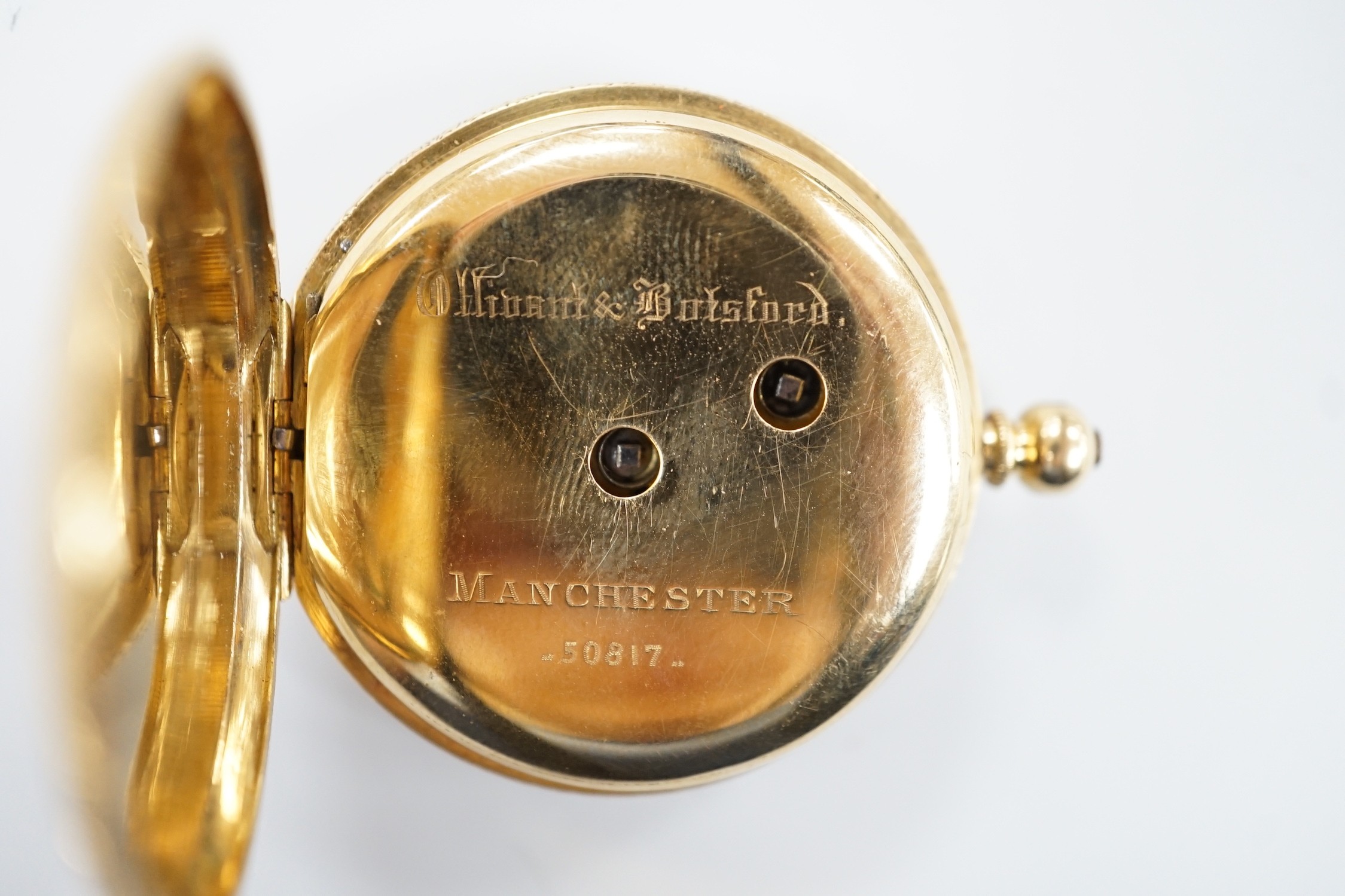 A continental 18k yellow metal open faced fob watch, with Roman dial and key, 40mm, gross weight 41.8 grams.